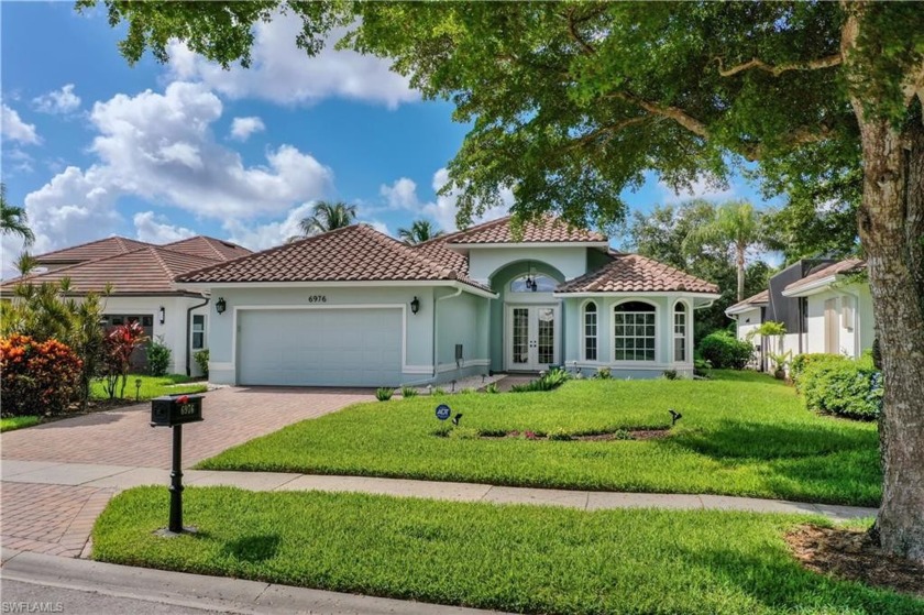 Enjoy serene lake views in the desirable Lely Resort. Perfectly - Beach Home for sale in Naples, Florida on Beachhouse.com