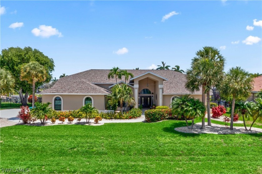 NO FLOOD DAMAGE!!  Welcome to an exquisite waterfront estate - Beach Home for sale in Cape Coral, Florida on Beachhouse.com