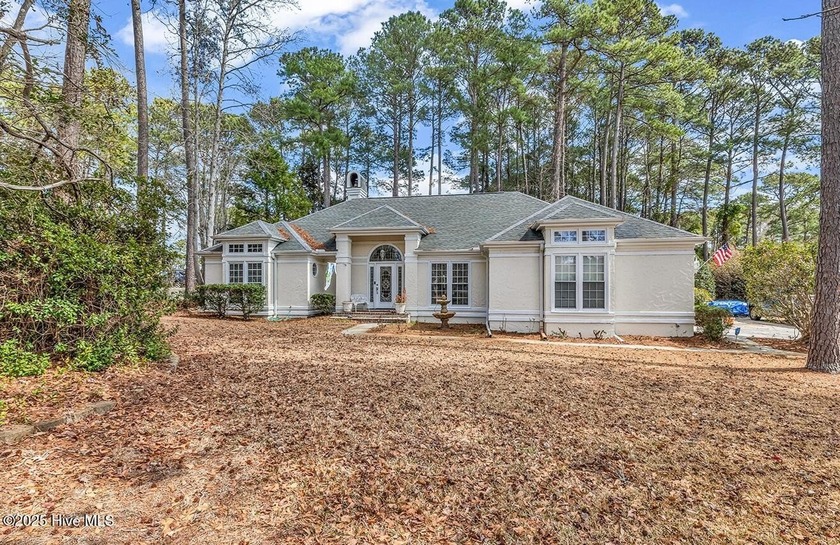 Situated in the highly sought-after River Hills Golf & Country - Beach Home for sale in Little River, South Carolina on Beachhouse.com