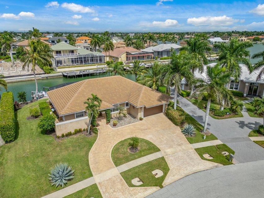 This home's location is a Boaters paradise with 130 feet of - Beach Home for sale in Marco Island, Florida on Beachhouse.com
