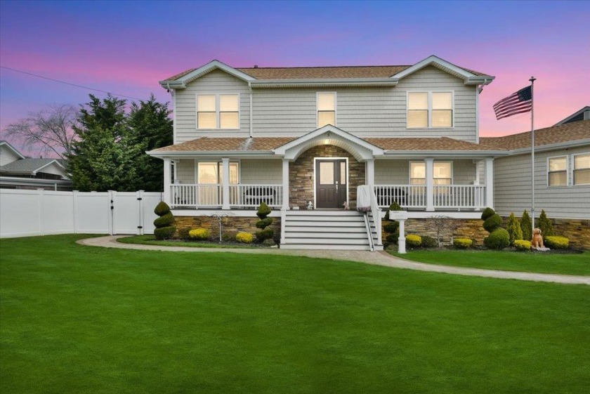 Move-In Ready Waterfront Gem Beautifully Rebuilt & Raised In - Beach Home for sale in Massapequa, New York on Beachhouse.com