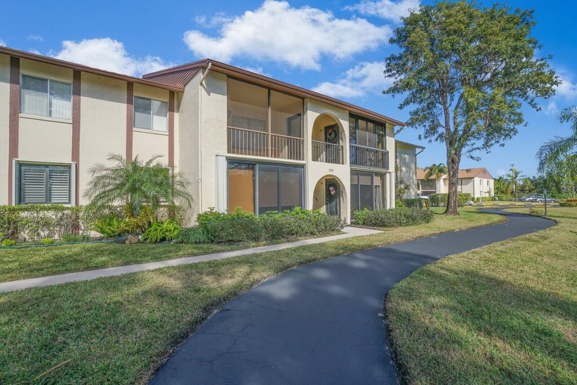 Welcome to the completely custom 2 bed, 2 bathroom lakefront - Beach Condo for sale in Greenacres, Florida on Beachhouse.com