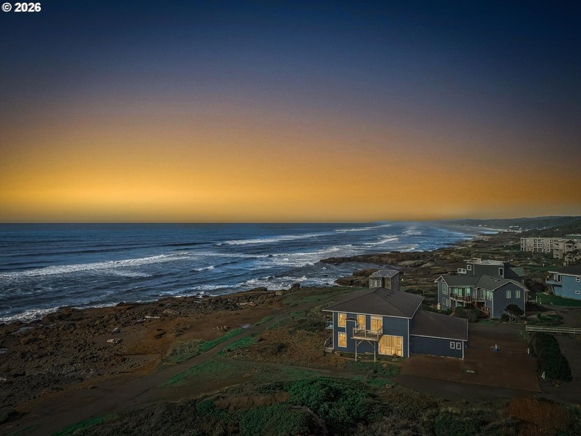 Commanding panoramic coastline views, this oceanfront residence - Beach Townhome/Townhouse for sale in Yachats, Oregon on Beachhouse.com
