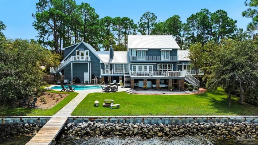 Experience unparalleled waterfront living in this exquisite - Beach Home for sale in Gulf Breeze, Florida on Beachhouse.com