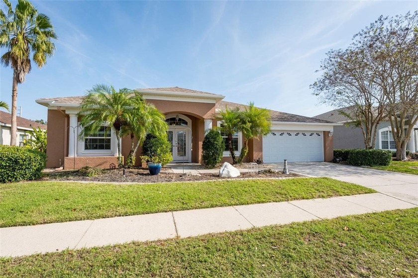 This spacious lakefront pool home offers four bedrooms, a den - Beach Home for sale in Bradenton, Florida on Beachhouse.com
