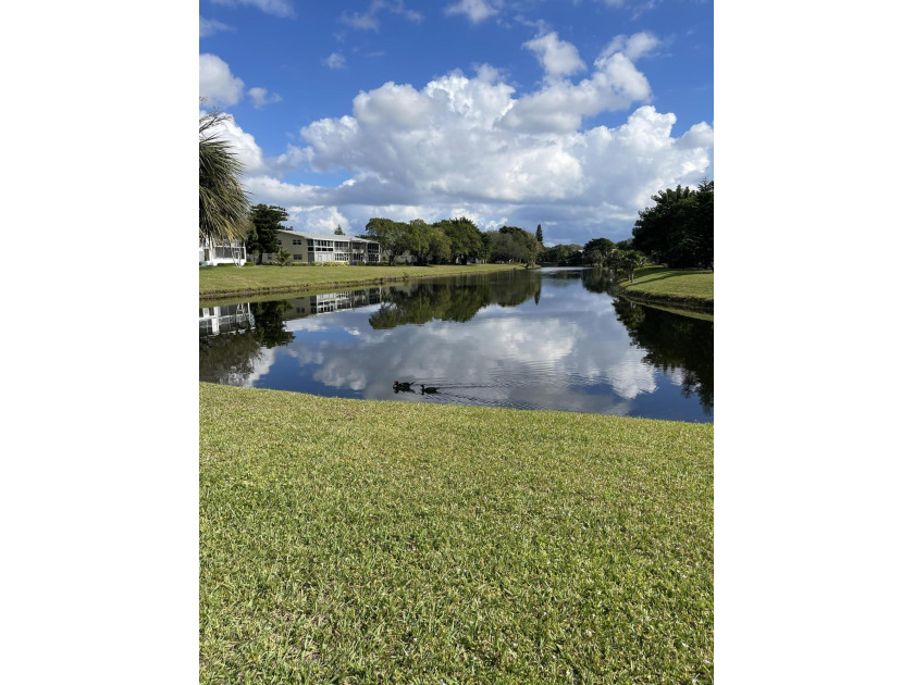1st FLOOR 2/1.5 bath UNIT WITH EXPANSIVE LAKE VIEW -YOU HAVE IT - Beach Condo for sale in Deerfield Beach, Florida on Beachhouse.com