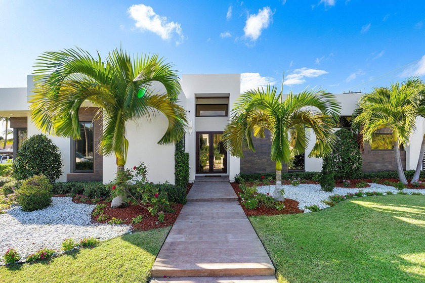 Stunning 4 bedroom, 3 bath single-story modern oasis ideally - Beach Home for sale in Lake Worth Beach, Florida on Beachhouse.com