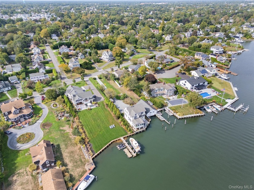 A rare opportunity to own a true riverfront classic in the heart - Beach Home for sale in Amityville, New York on Beachhouse.com