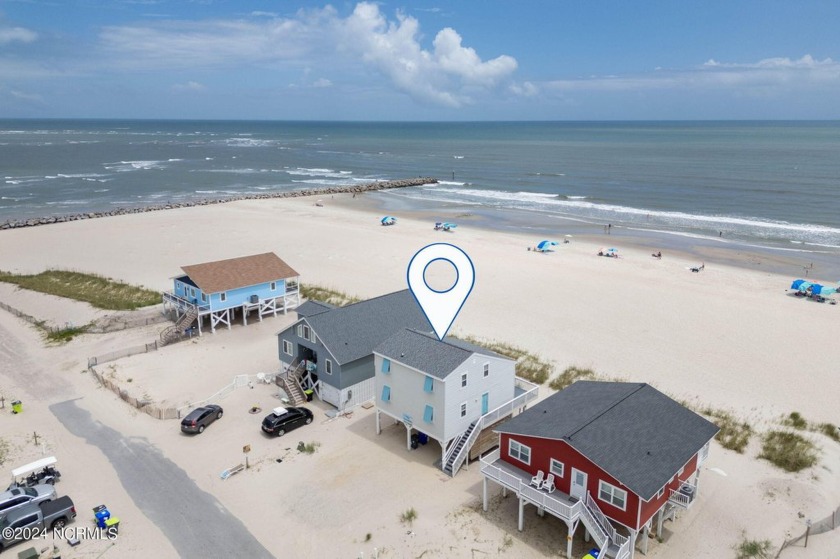 Step into serenity with this stunning 4-bedroom, 2-bathroom home - Beach Home for sale in Ocean Isle Beach, North Carolina on Beachhouse.com