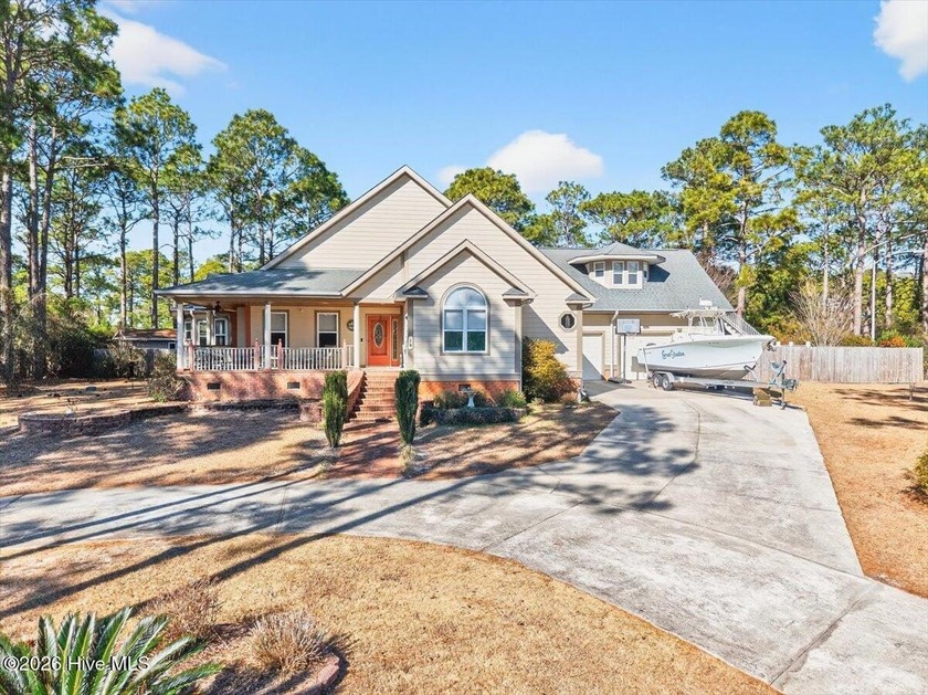 Welcome to 18 Brierwood Road, a custom-built home situated on a - Beach Home for sale in Shallotte, North Carolina on Beachhouse.com