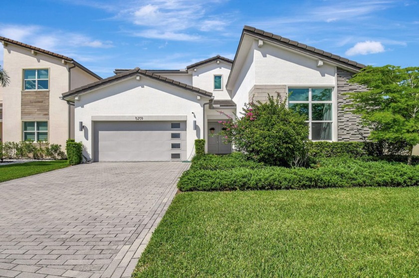 Welcome to 5209 Beland Drive, Lake Worth, Florida where elegance - Beach Home for sale in Lake Worth, Florida on Beachhouse.com