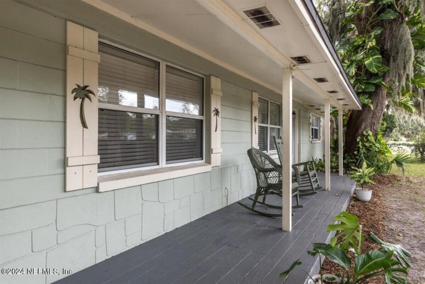 Featuring tile plank flooring throughout, this home offers a - Beach Home for sale in Jacksonville, Florida on Beachhouse.com