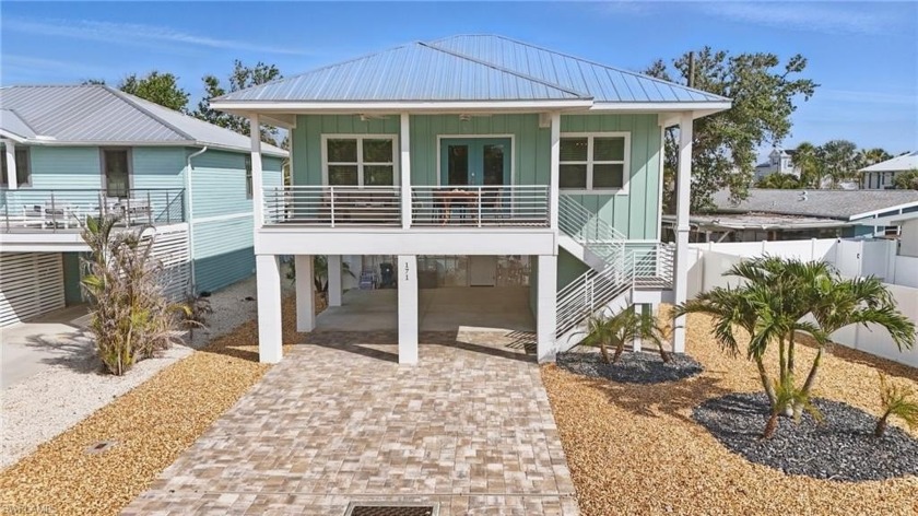 Enjoy luxury coastal living in this newly built, custom elevated - Beach Home for sale in Fort Myers Beach, Florida on Beachhouse.com