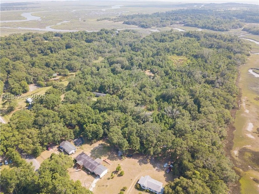 Discover your own Lowcountry escape on this nearly 5-acre wooded - Beach Lot for sale in Saint Helena Island, South Carolina on Beachhouse.com