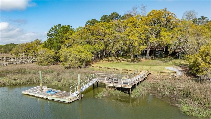 Charming Marsh front Cottage with Private Dock! Discover your - Beach Home for sale in Okatie, South Carolina on Beachhouse.com