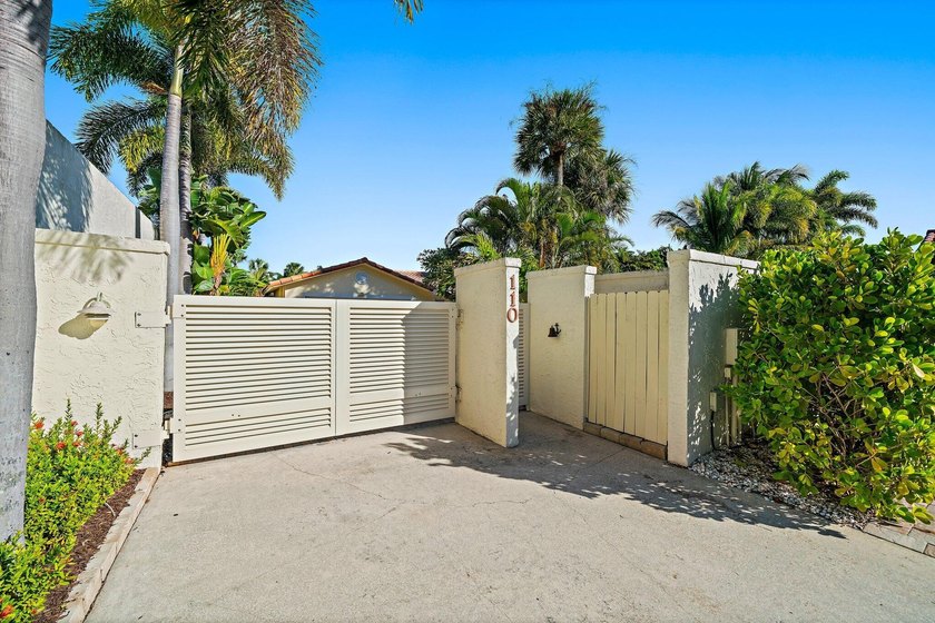 This gated, beach-proximate home offers an exceptional entry - Beach Home for sale in Jupiter, Florida on Beachhouse.com