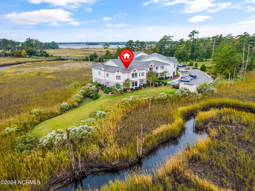 Come see this QUIET, hidden gem with beautiful panoramic marsh - Beach Condo for sale in Wilmington, North Carolina on Beachhouse.com
