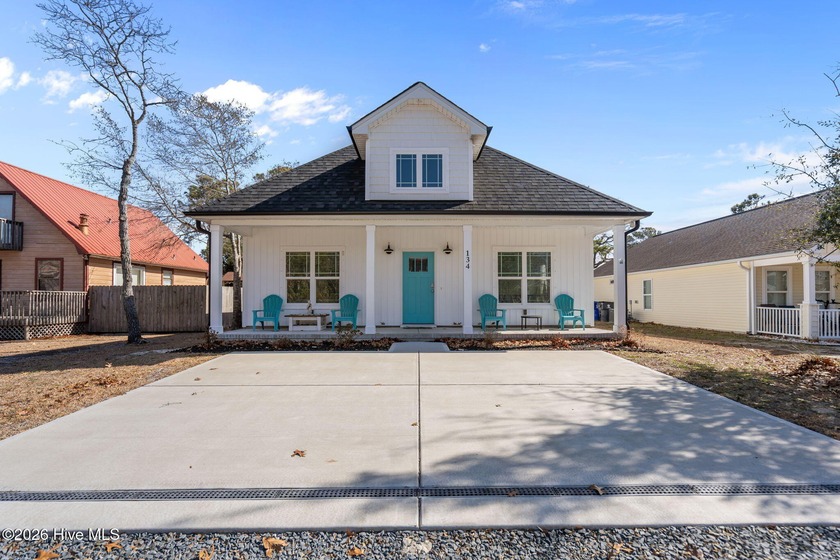 This almost new 2023 pristine open floor-plan beach home - Beach Home for sale in Oak Island, North Carolina on Beachhouse.com