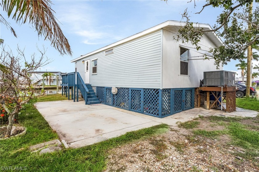 Motivated seller!  This manufactured home is situated on a canal - Beach Home for sale in ST. James City, Florida on Beachhouse.com
