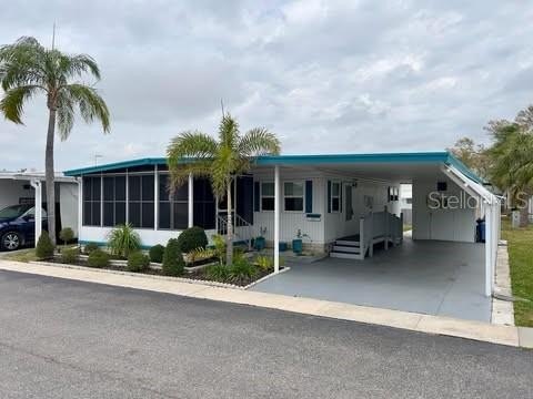 DOUBLE WIDE WITH 2 BEDROOMS AND 2 BATHROOMS. This 1608 sqft home - Beach Home for sale in Pinellas Park, Florida on Beachhouse.com