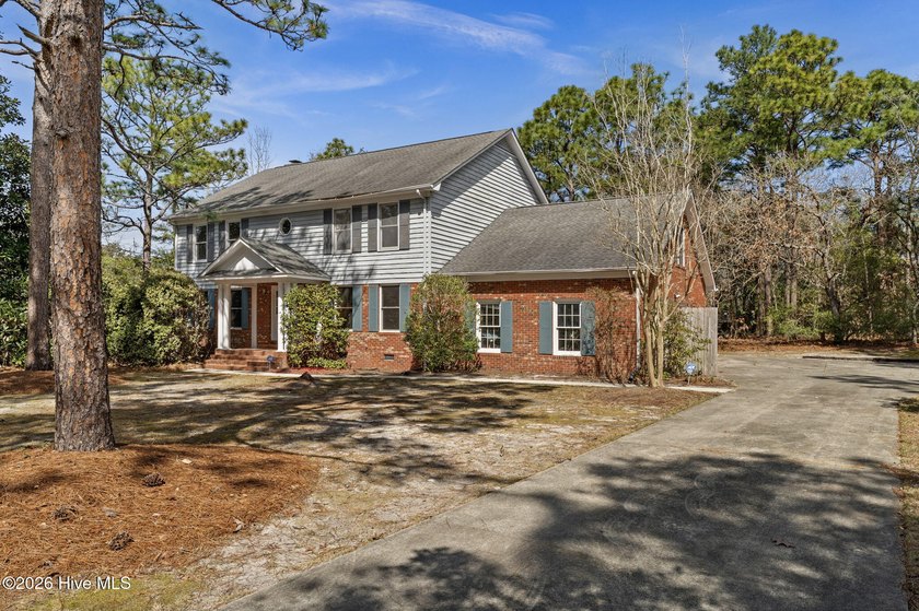 Tucked within a quiet, tree-lined neighborhood nestled between - Beach Home for sale in Wilmington, North Carolina on Beachhouse.com