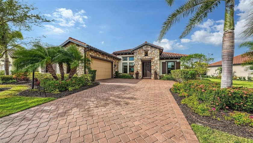 Set on a premier homesite with breathtaking lake and preserve - Beach Home for sale in Lakewood Ranch, Florida on Beachhouse.com