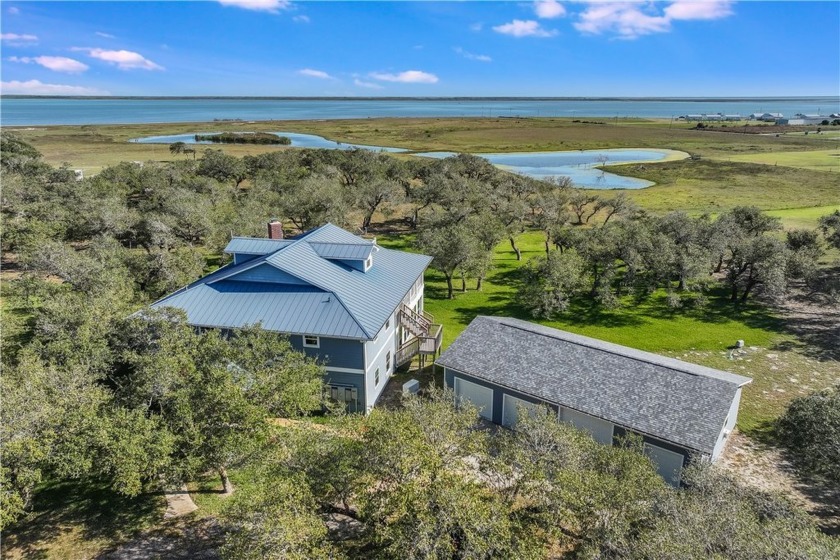 Nestled on 3.09 private acres, this 4,313 sqft estate offers - Beach Home for sale in Rockport, Texas on Beachhouse.com