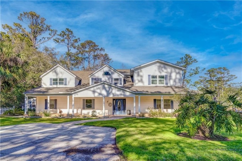 PRICED UNDER APPRAISED VALUE!  Enjoy beautiful lake views from - Beach Home for sale in Saint Simons, Georgia on Beachhouse.com