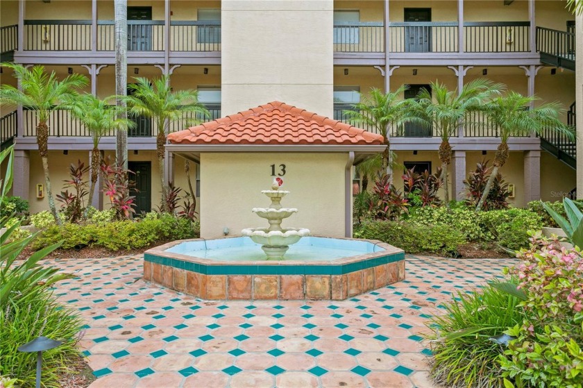 Experience serene pond views from this first-floor, corner unit - Beach Condo for sale in Clearwater, Florida on Beachhouse.com