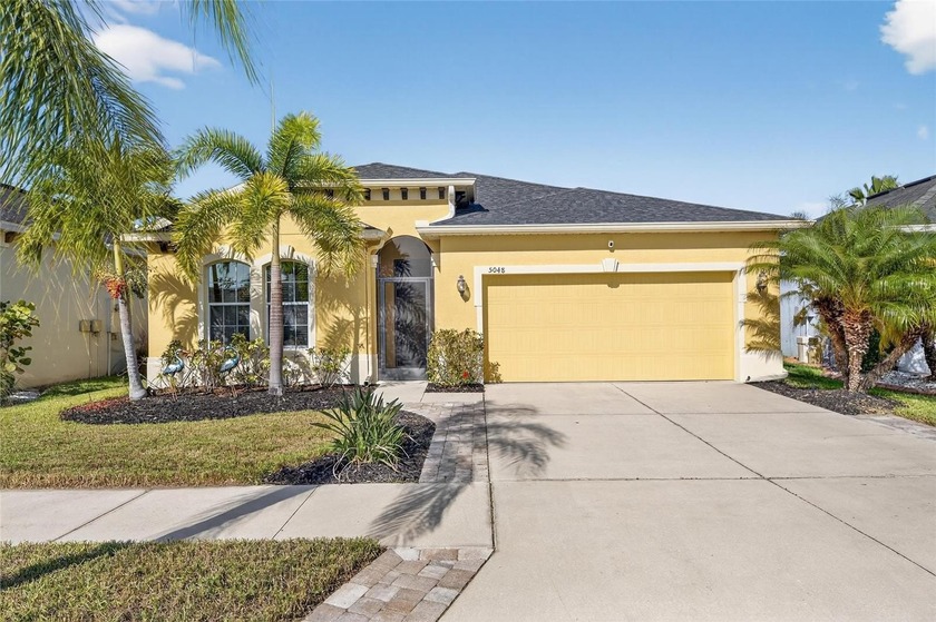 Welcome to this exceptional 4-bedroom, 2-bath home offering over - Beach Home for sale in Apollo Beach, Florida on Beachhouse.com