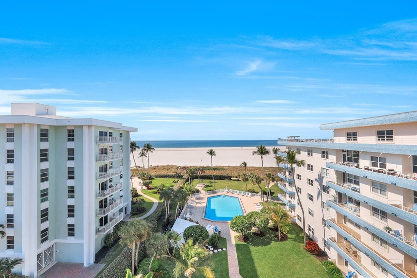 Presenting a rarely available three-bedroom plus den, three and - Beach Condo for sale in Marco Island, Florida on Beachhouse.com