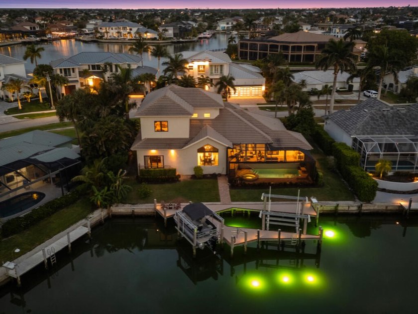 Magnificent waterfront home features 100' of waterfrontage, a - Beach Home for sale in Marco Island, Florida on Beachhouse.com