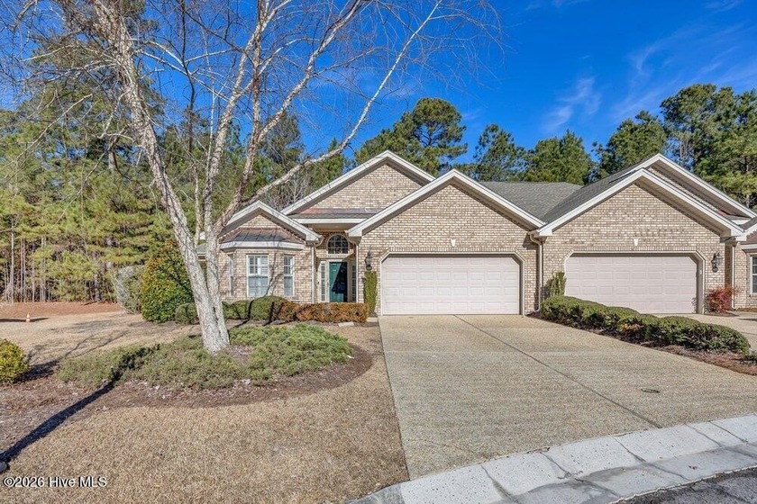 This meticulously maintained all-brick townhome, tucked away on - Beach Townhome/Townhouse for sale in Leland, North Carolina on Beachhouse.com