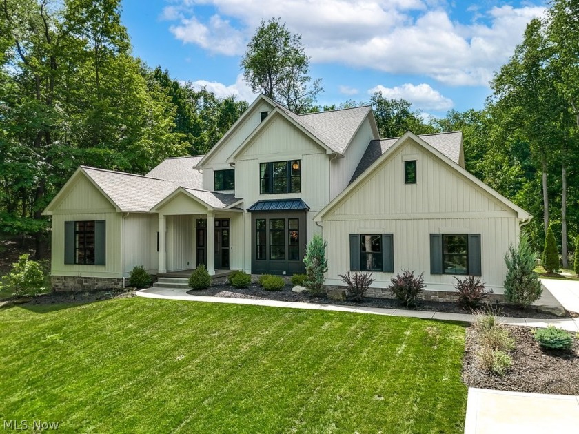 Nestled on over 1.5 wooded acres in Orange School District, this - Beach Home for sale in Cleveland, Ohio on Beachhouse.com