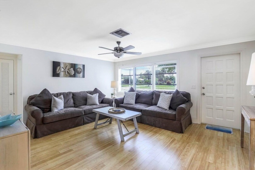 Step into this beautifully updated 3-bedroom island retreat on - Beach Home for sale in Marco Island, Florida on Beachhouse.com