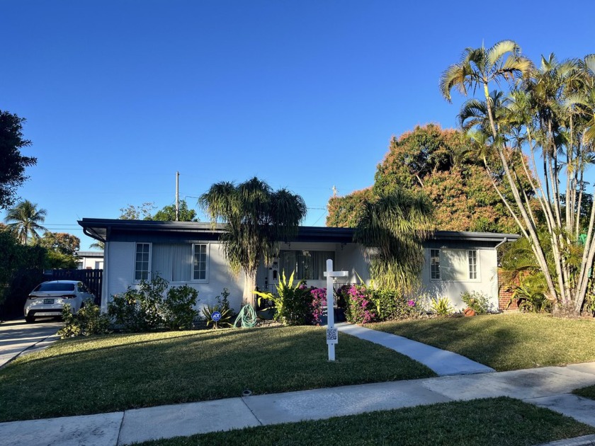 Sitting on a big 8,000 square foot lot this bright & sunny, 3 - Beach Home for sale in West Palm Beach, Florida on Beachhouse.com