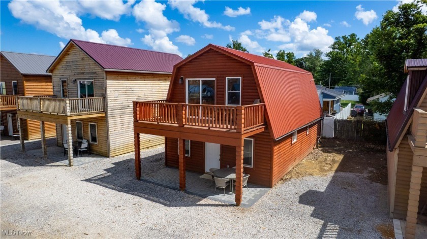 Charming Cabin-Style Retreat with Lake Views - Steps to the - Beach Condo for sale in Ashtabula, Ohio on Beachhouse.com
