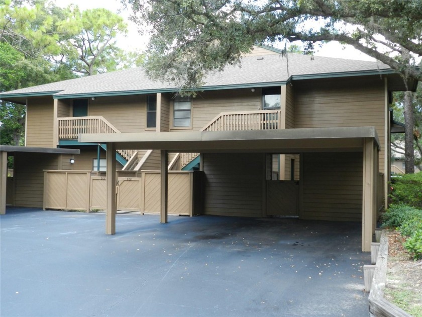 Freshly painted 2 bedroom, 2 bath ground floor end unit with1 - Beach Condo for sale in Palm Harbor, Florida on Beachhouse.com