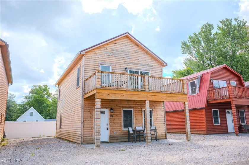 Charming Cabin-Style Retreat with Lake Views - Steps to the - Beach Condo for sale in Ashtabula, Ohio on Beachhouse.com