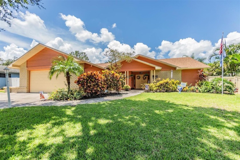 This fantastic 4BR/3BA Palm Harbor home checks all the boxes! - Beach Home for sale in Palm Harbor, Florida on Beachhouse.com