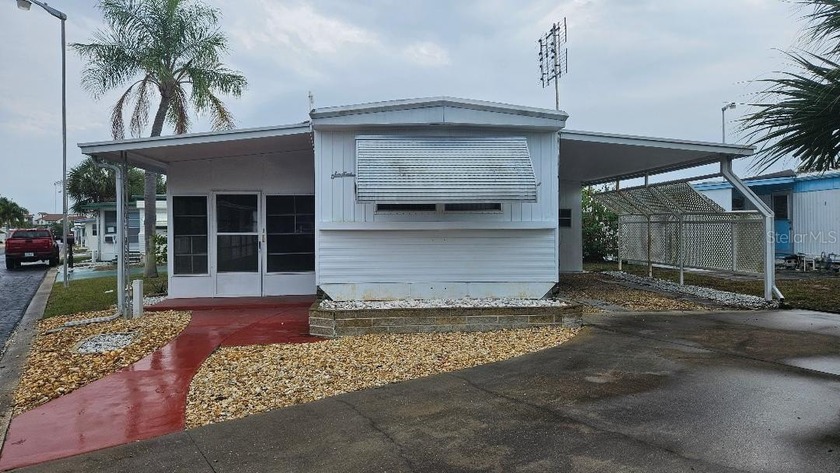 BEAUTIFUL LAND OWNED MAJESTIC PARK MOBILE HOME PARK. THIS HOME - Beach Home for sale in Seminole, Florida on Beachhouse.com