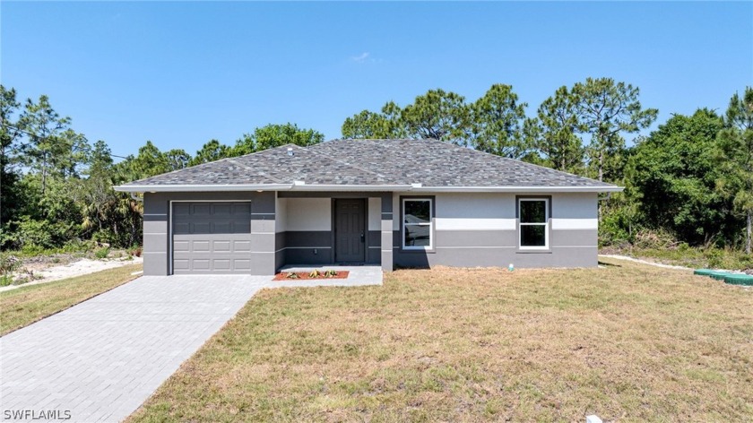 You Will Be Amazed By The Quality Of This Brand New Construction - Beach Home for sale in Lehigh Acres, Florida on Beachhouse.com