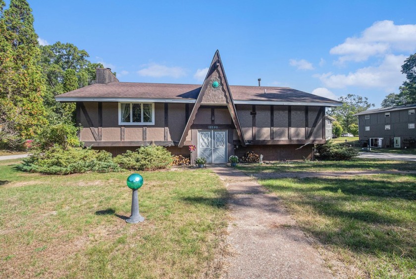 Welcome to a unique, completely remodeled property that has tons - Beach Home for sale in Spring Lake, Michigan on Beachhouse.com