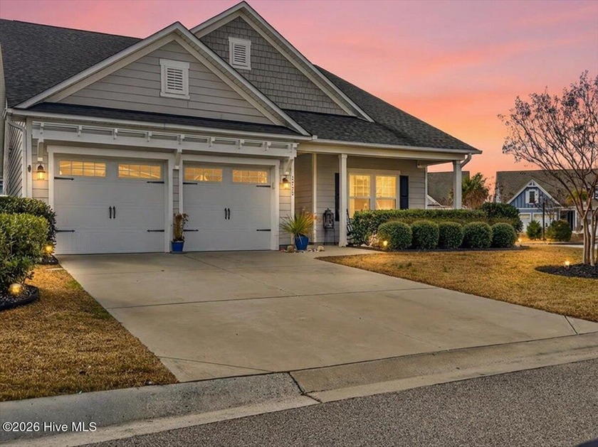 The welcoming front porch sets the tone for this beautiful home - Beach Home for sale in Southport, North Carolina on Beachhouse.com