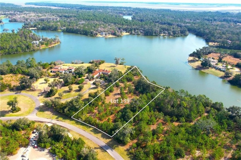 Enjoy the privacy and beauty of this stunning lakefront homesite - Beach Acreage for sale in Saint Simons, Georgia on Beachhouse.com