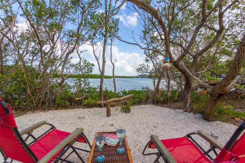 Nestled on the popular north end of Longboat Key awaits a - Beach Home for sale in Longboat Key, Florida on Beachhouse.com