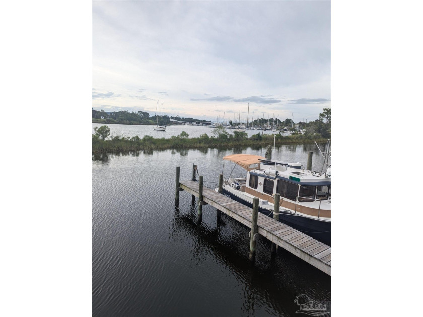 Featuring three bedrooms, two full baths and one 1/2 bath, this - Beach Home for sale in Pensacola, Florida on Beachhouse.com