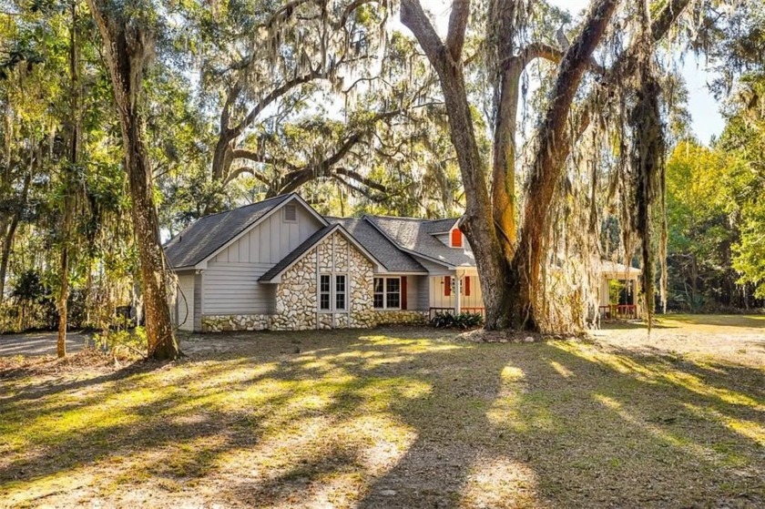 This charming 3-bedroom, 2-bath ranch-style home offers - Beach Home for sale in Woodbine, Georgia on Beachhouse.com