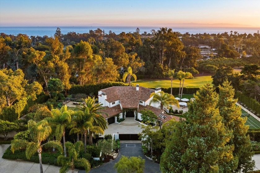 This gated Spanish-style Estate is perfectly nestled between the - Beach Home for sale in Santa Barbara, California on Beachhouse.com