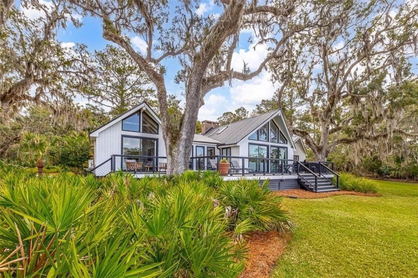 Nestled on a private 4.5-acre lot on St. Simons Island, this - Beach Home for sale in Saint Simons, Georgia on Beachhouse.com